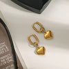 Gold Oval Hoop Earrings with Puffed Heart Charms